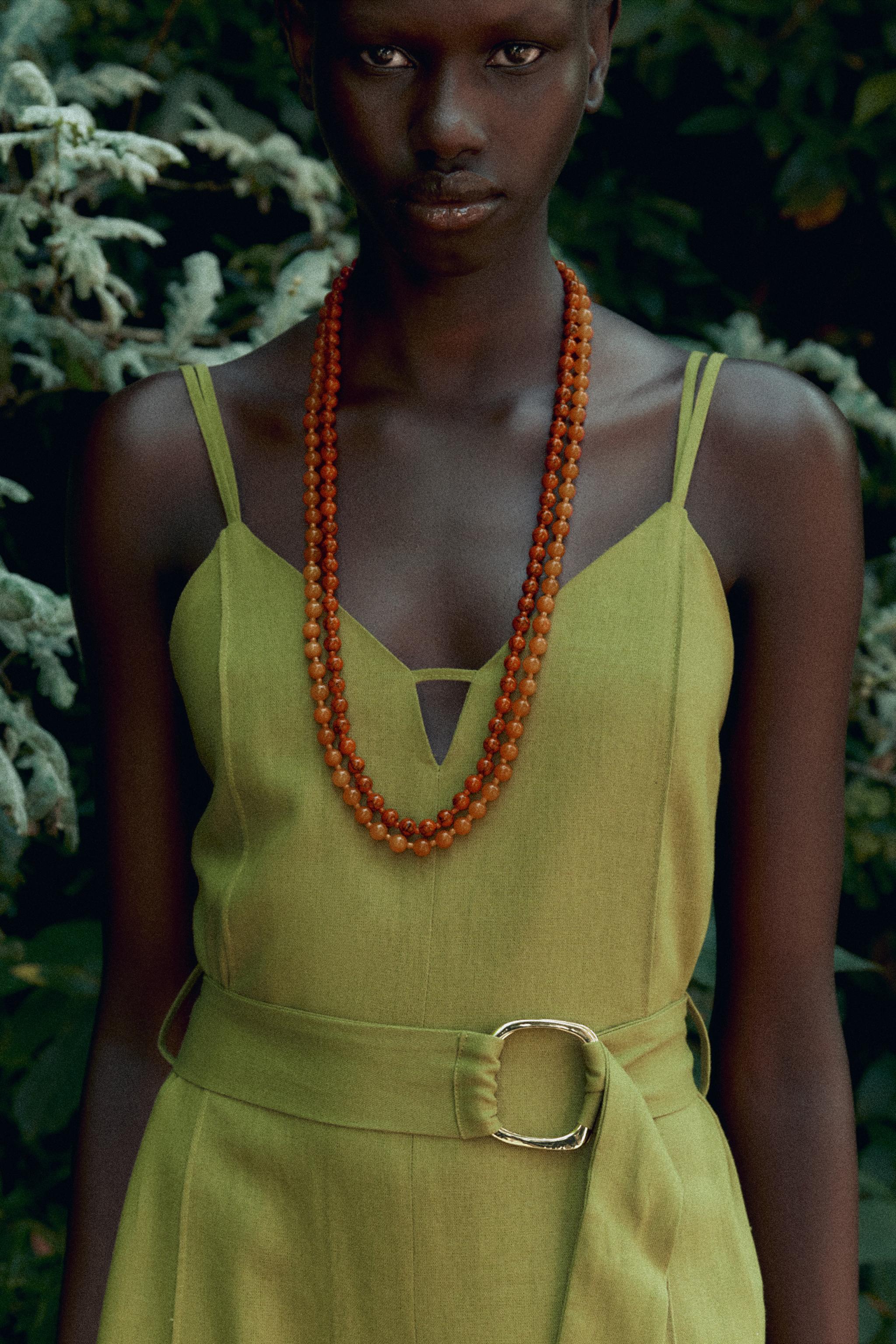 WIDE-LEG STRAPPY LINEN JUMPSUIT